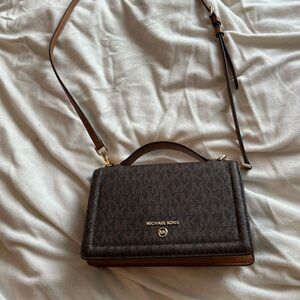 SOLD Michael Kors “Jet set” small cross body bag